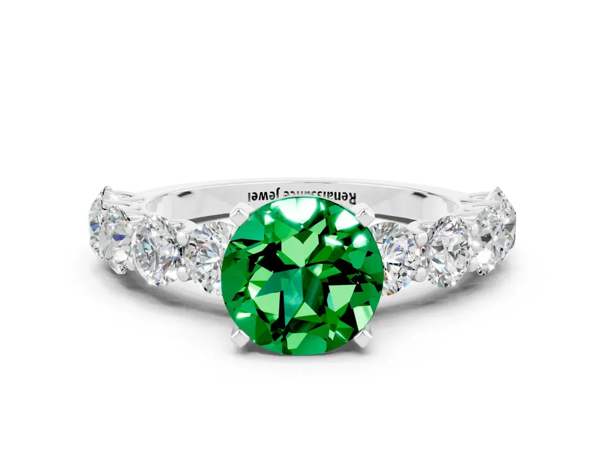 Round Cut Emerald Prong Setting with Side Stones on a Pave Band Platinum