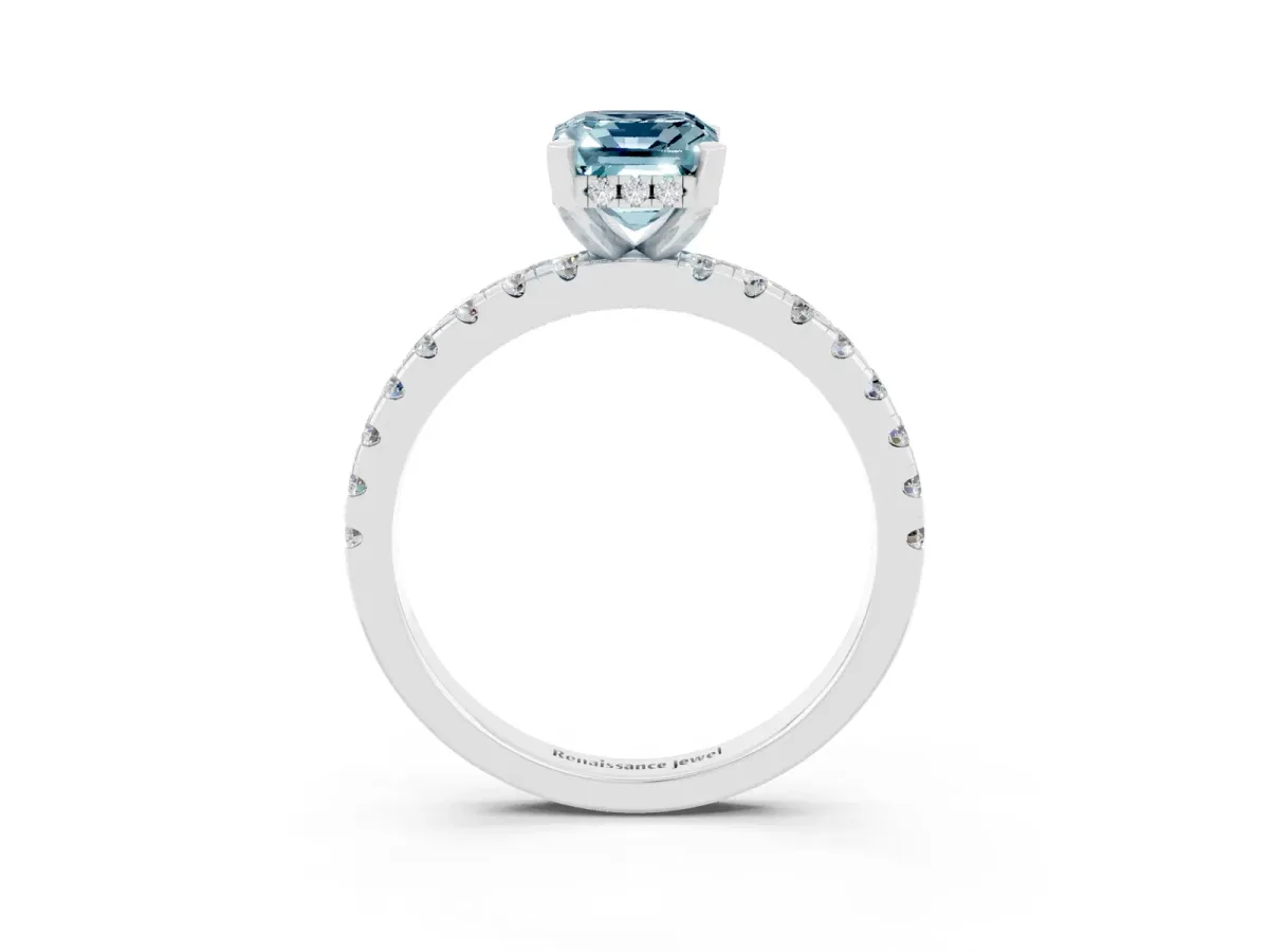 Emerald Cut Aquamarine Solitaire Ring with Round Pavé Band and Four-Prong Setting Silver