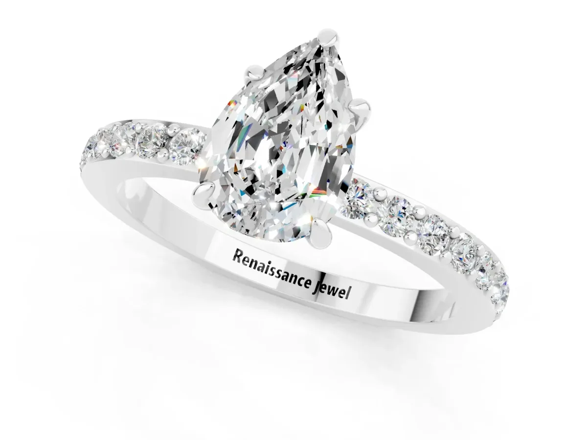 Pear Cut Moissanite Solitaire Engagement Ring with Pavé Band and Four-Prong Setting Silver