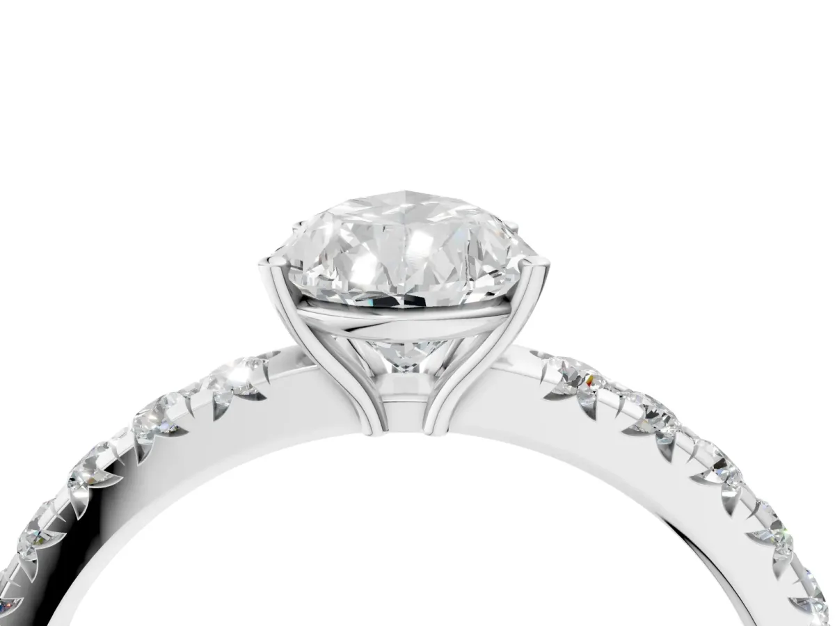 Pear Cut Diamond Pavé Solitaire Engagement Ring with Four-Prong Setting Silver