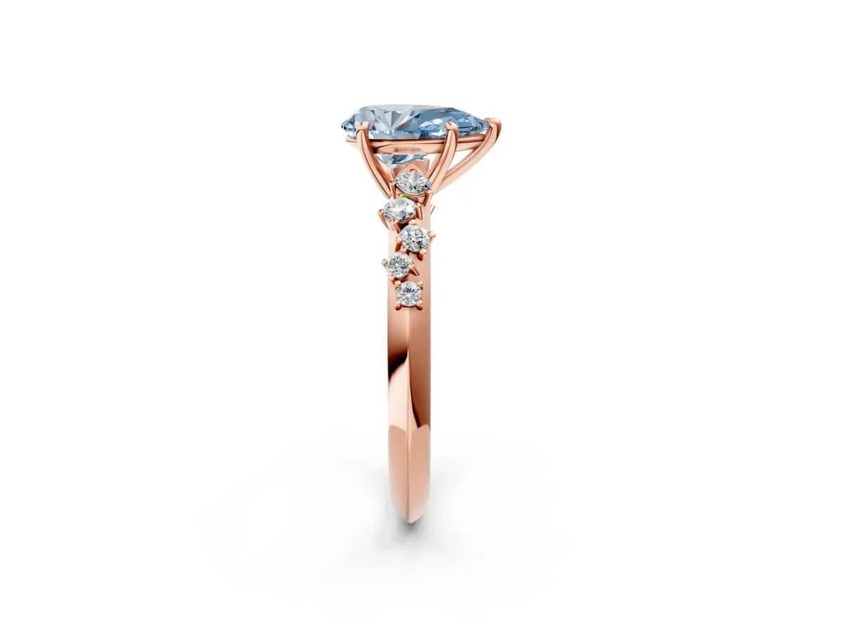 Fancy Blue Pear Cut Diamond Cluster Side Stone Solitaire Ring with Prong Setting Rose gold