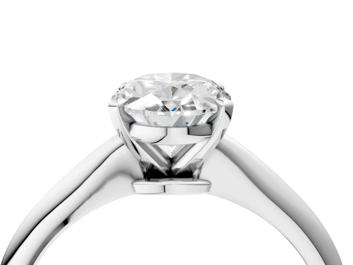 Oval Cut Diamond Solitaire Engagement Ring with Classic Band and Four-Prong Setting Silver
