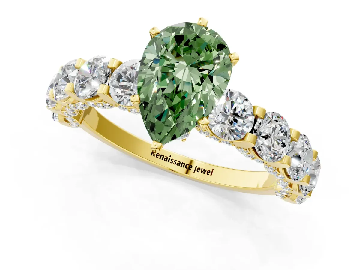 Fancy Green Pear Cut Diamond Side Stone Engagement Ring with Four-Prong Setting Yellow gold