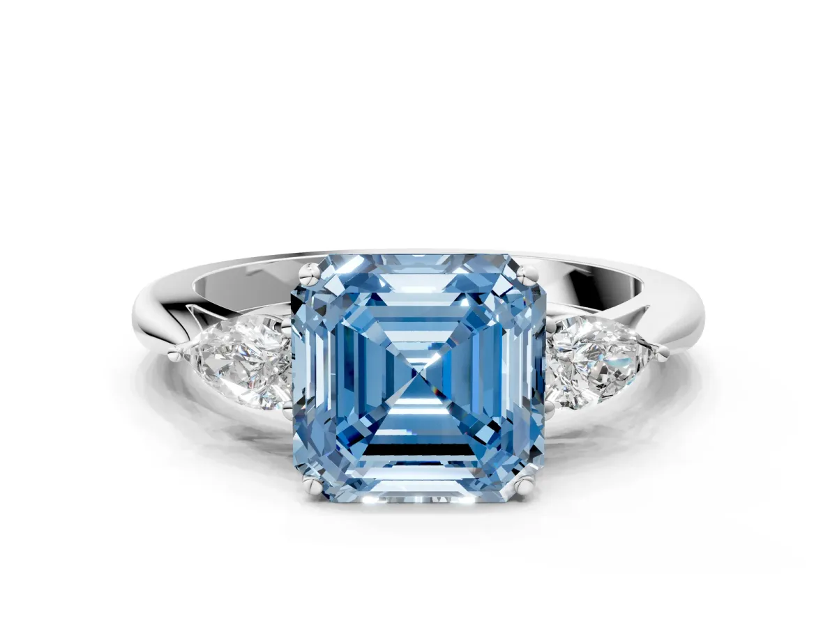 Fancy Blue Three-Stone Asscher Cut Diamond Ring with Pear Side Stones in Four-Prong Setting Platinum