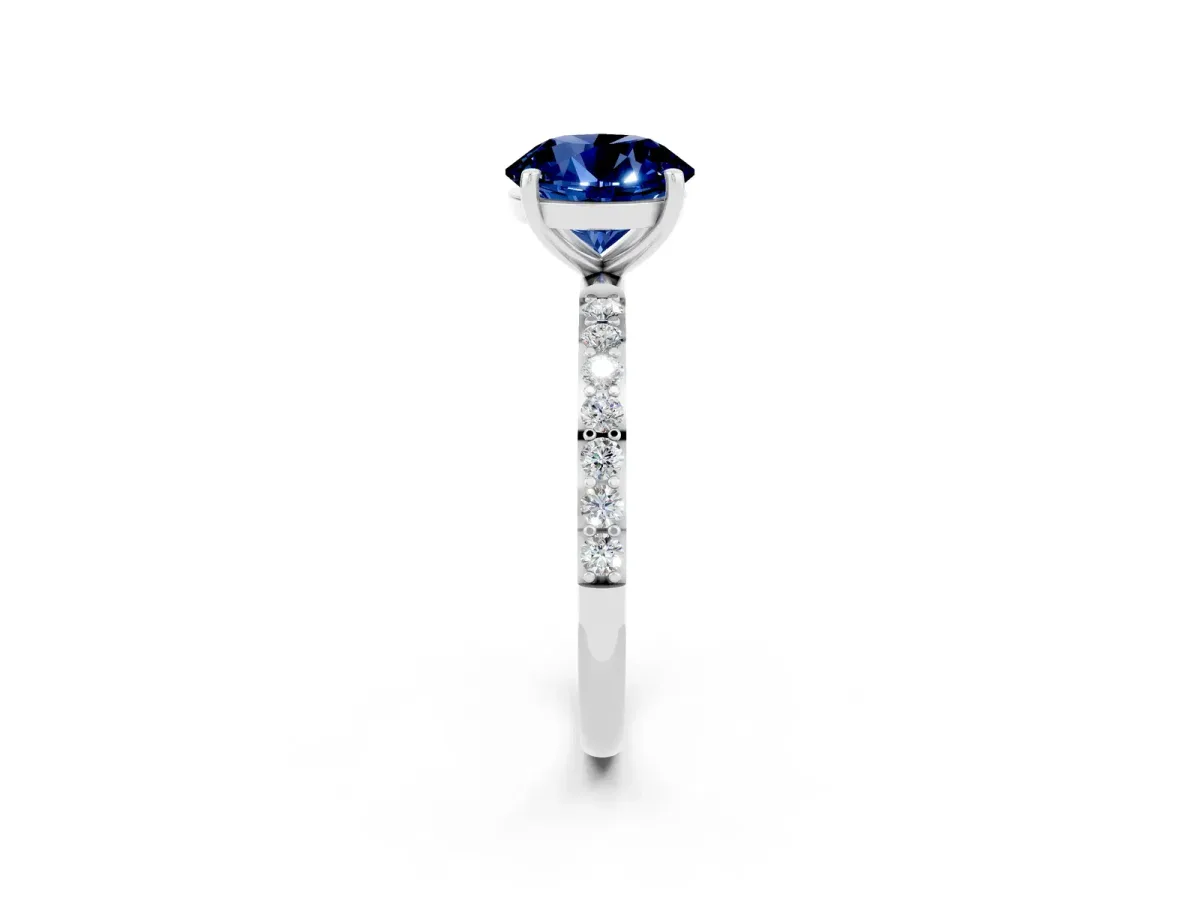 Round Cut Blue Sapphire Solitaire Ring with Round Pavé Band and Prong Setting Silver