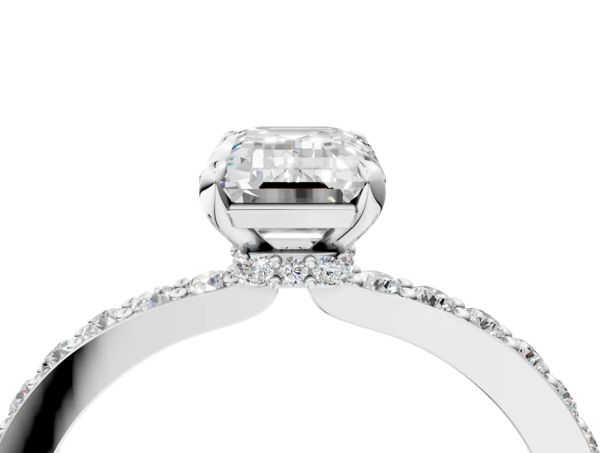 Emerald Cut Diamond Solitaire Engagement Ring with Pavé Band and Four-Prong Setting Silver