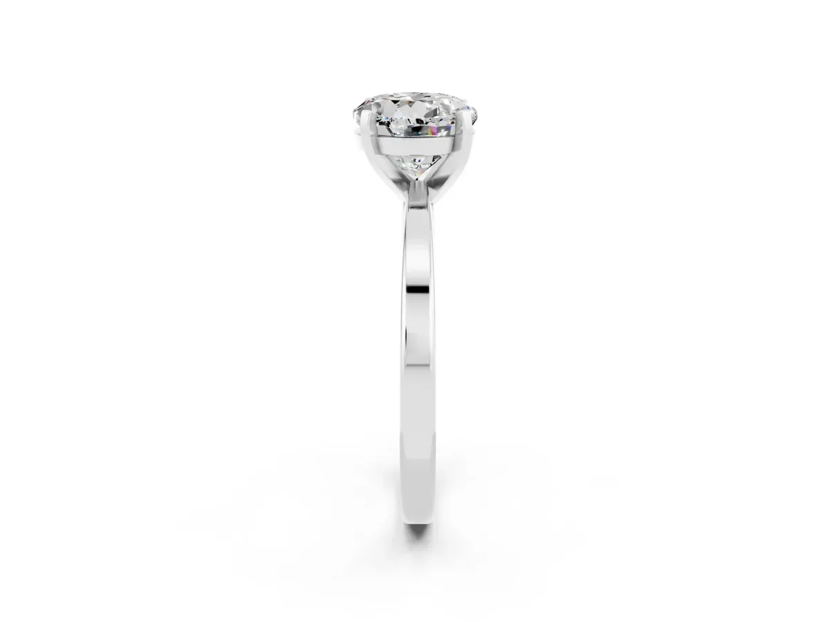 Round Cut Moissanite Solitaire Engagement Ring with Classic Band and Four-Prong Setting Silver