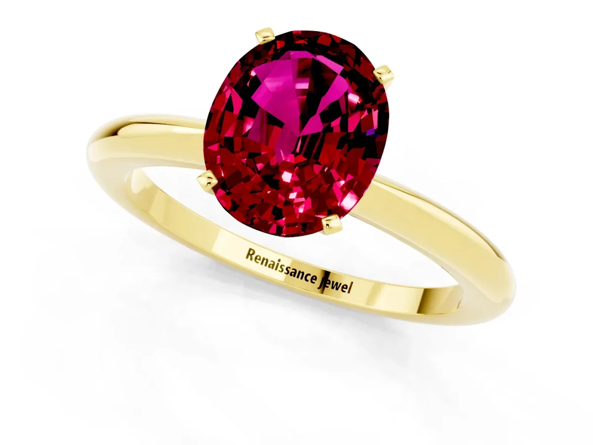 Oval Cut Garnet Solitaire Ring with Six-Prong Setting and Classic Band Yellow gold