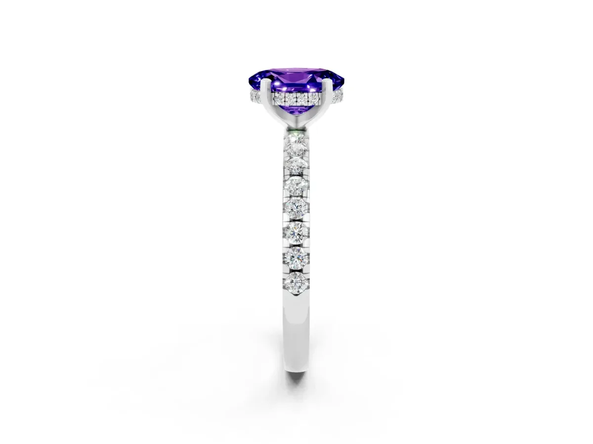 Oval Cut Tanzanite Solitaire Ring with Round Pavé Band and Four-Prong Setting Silver