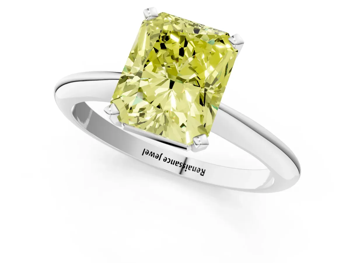 Fancy Yellow Radiant Cut Cut Solitaire Ring with Four-Prong Setting on a Classic Band Platinum