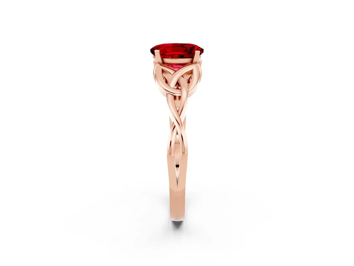 Oval Cut Ruby Solitaire Engagement Ring with Celtic Knot Band and Four-Prong Setting Rose gold