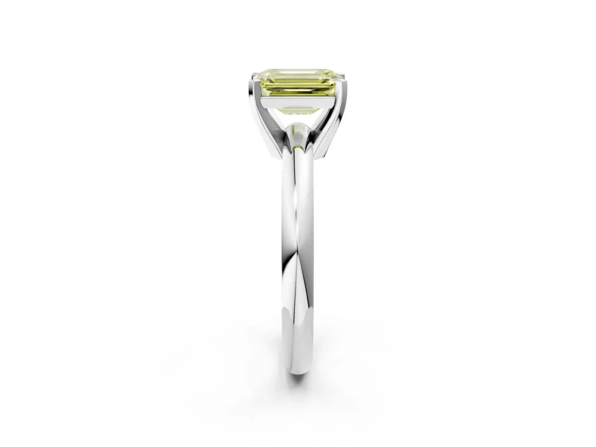 Fancy Yellow Emerald Cut Diamond Solitaire Engagement Ring with Round Band and Four-Prong Setting Silver