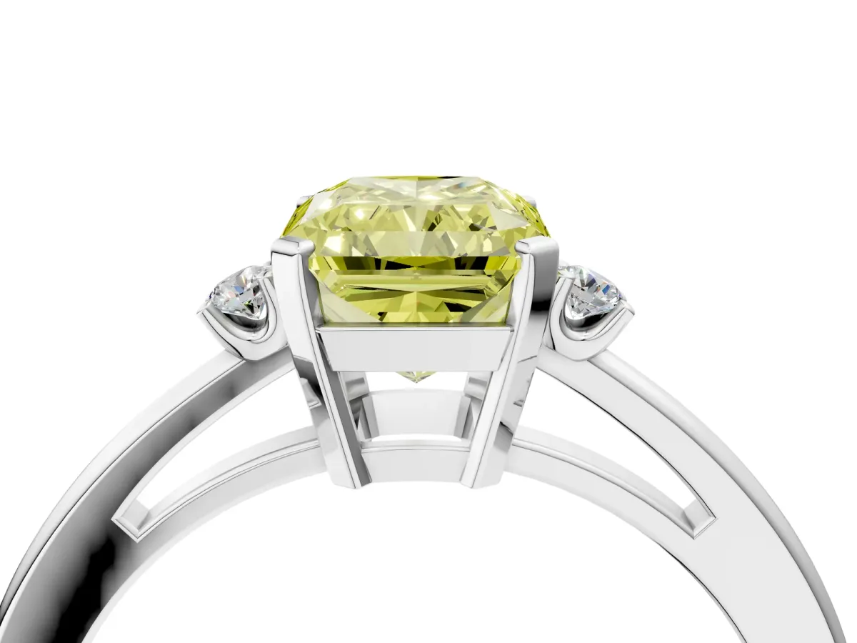 Fancy Yellow Radiant Cut Cut Three-Stone Solitaire Ring with Round Accent Diamonds and Four-Prong Setting Platinum