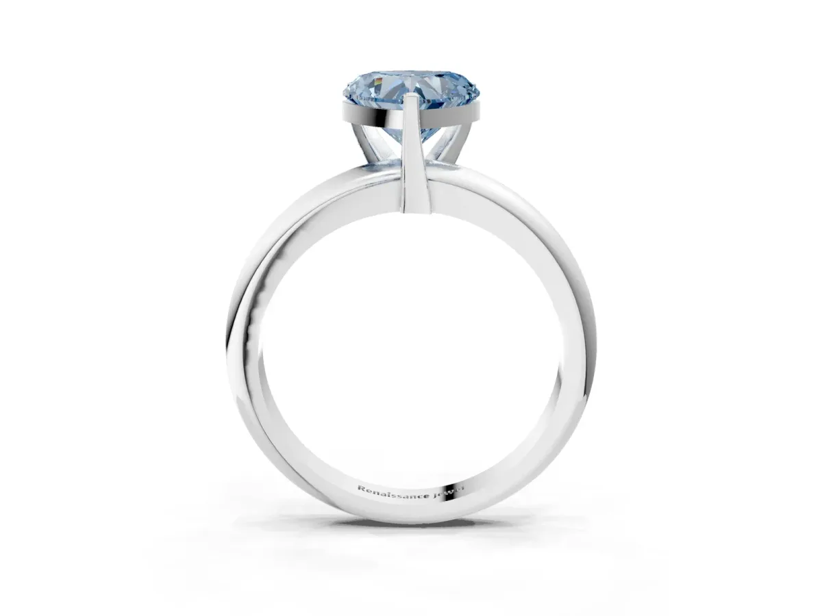 Fancy Blue Heart Cut Diamond Solitaire Engagement Ring with Round Band and Four-Prong Setting Silver