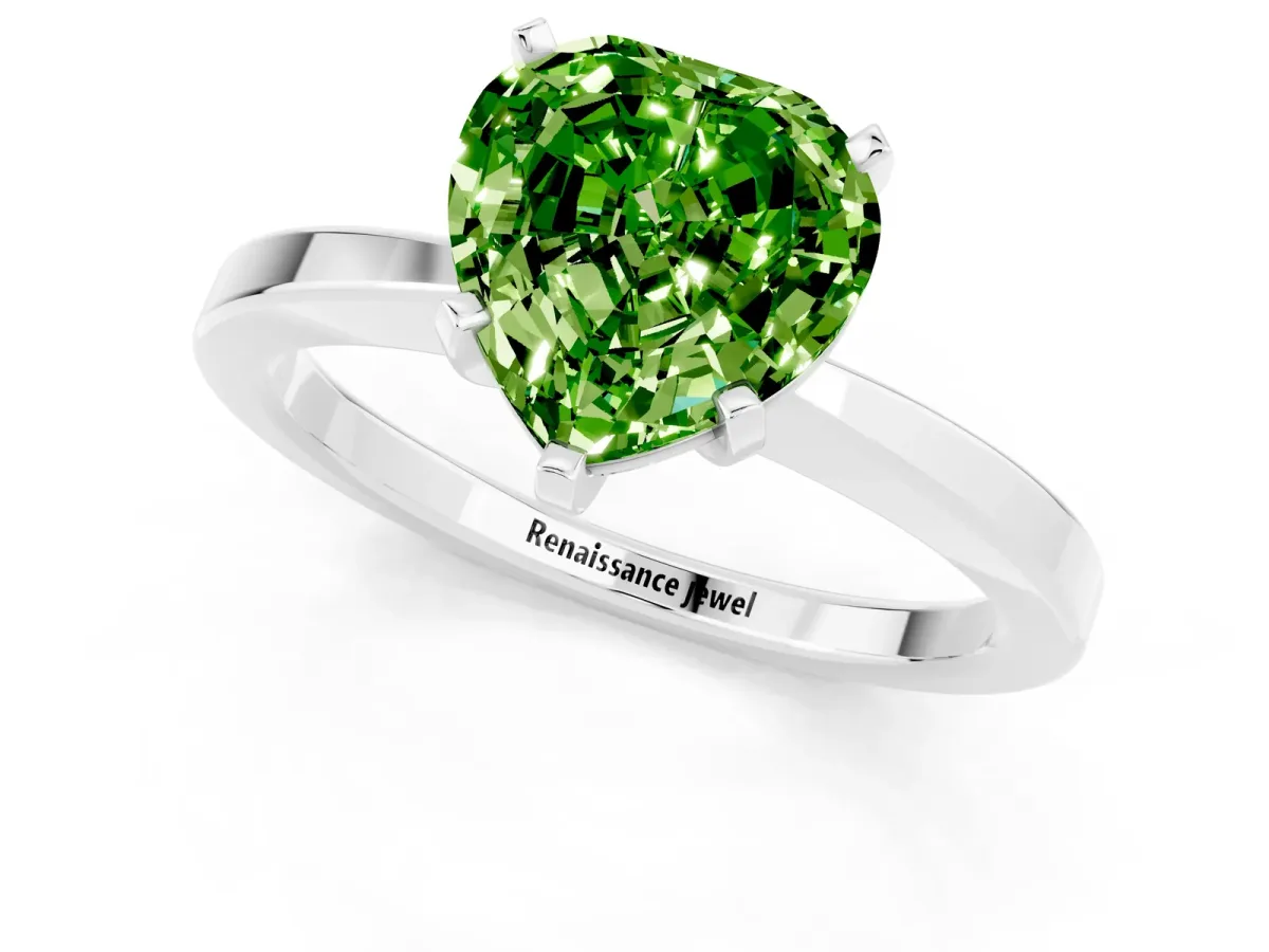 Heart Cut Peridot Solitaire Engagement Ring with Classic Band and Four-Prong Setting Silver