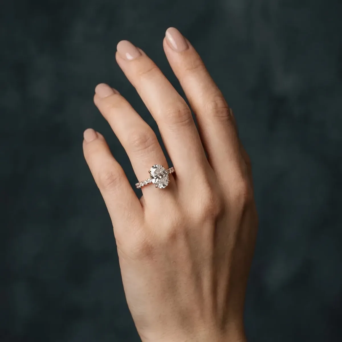 Oval Cut Diamond Pave Band Solitaire Ring with Round and Prong Setting Rose gold