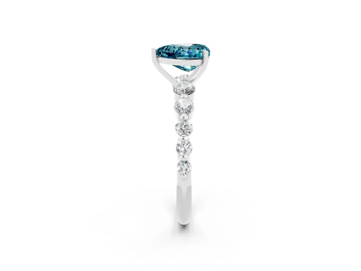 Heart Cut Solitaire Blue Topaz Ring with Pave Band and Four-Prong Setting Silver