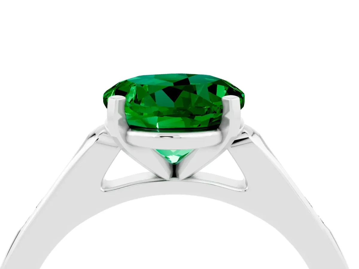 Round Cut Emerald Solitaire Ring with Channel Set Round Band and Prong Setting Silver