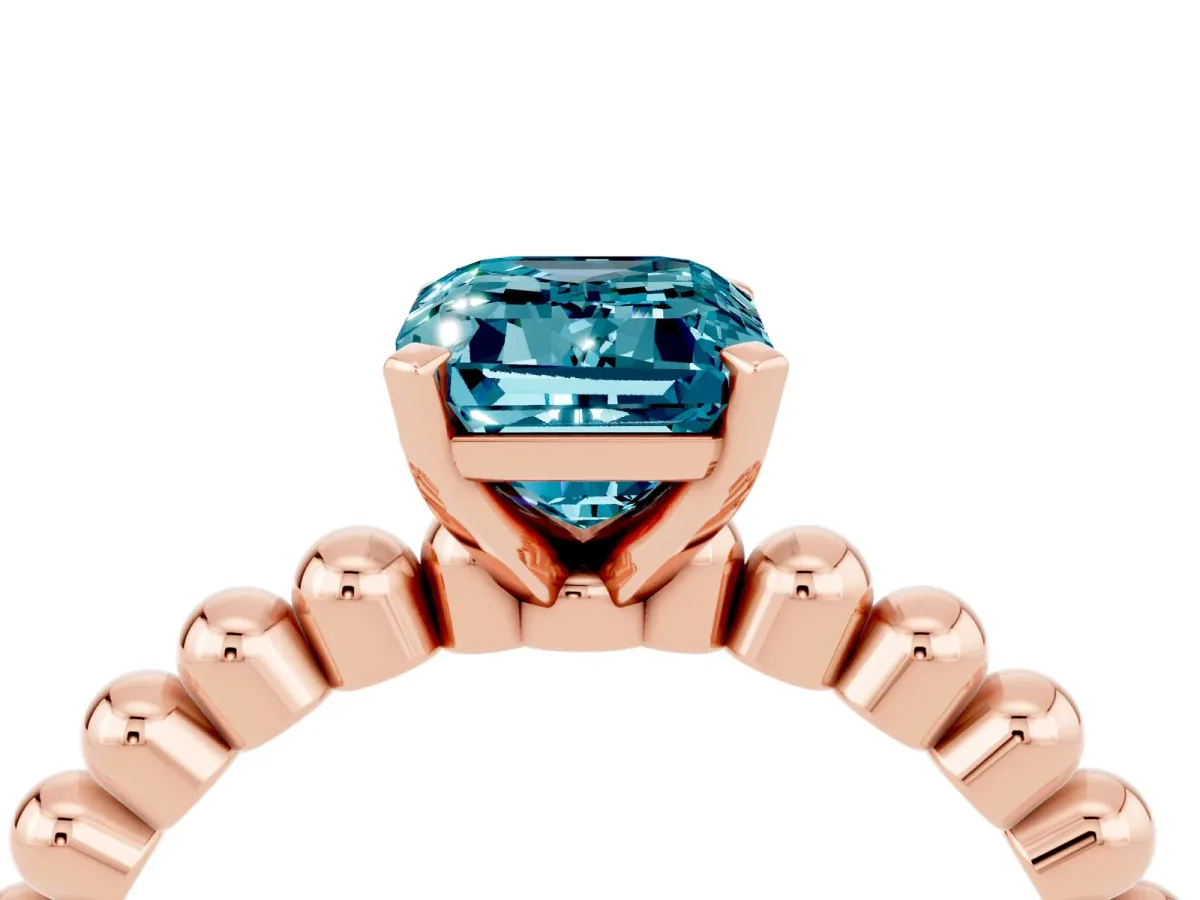 Emerald Cut Blue Topaz Solitaire Ring with Beaded Band and Prong Setting Rose gold