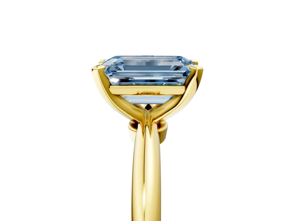 Fancy Blue Emerald Cut Diamond Solitaire Ring with Six-Prong Setting and Classic Band Yellow gold