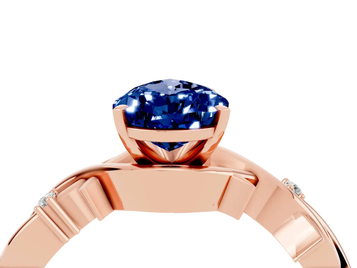 Pear Cut Blue Sapphire Solitaire Ring with Twisted Band and Prong Setting Rose gold