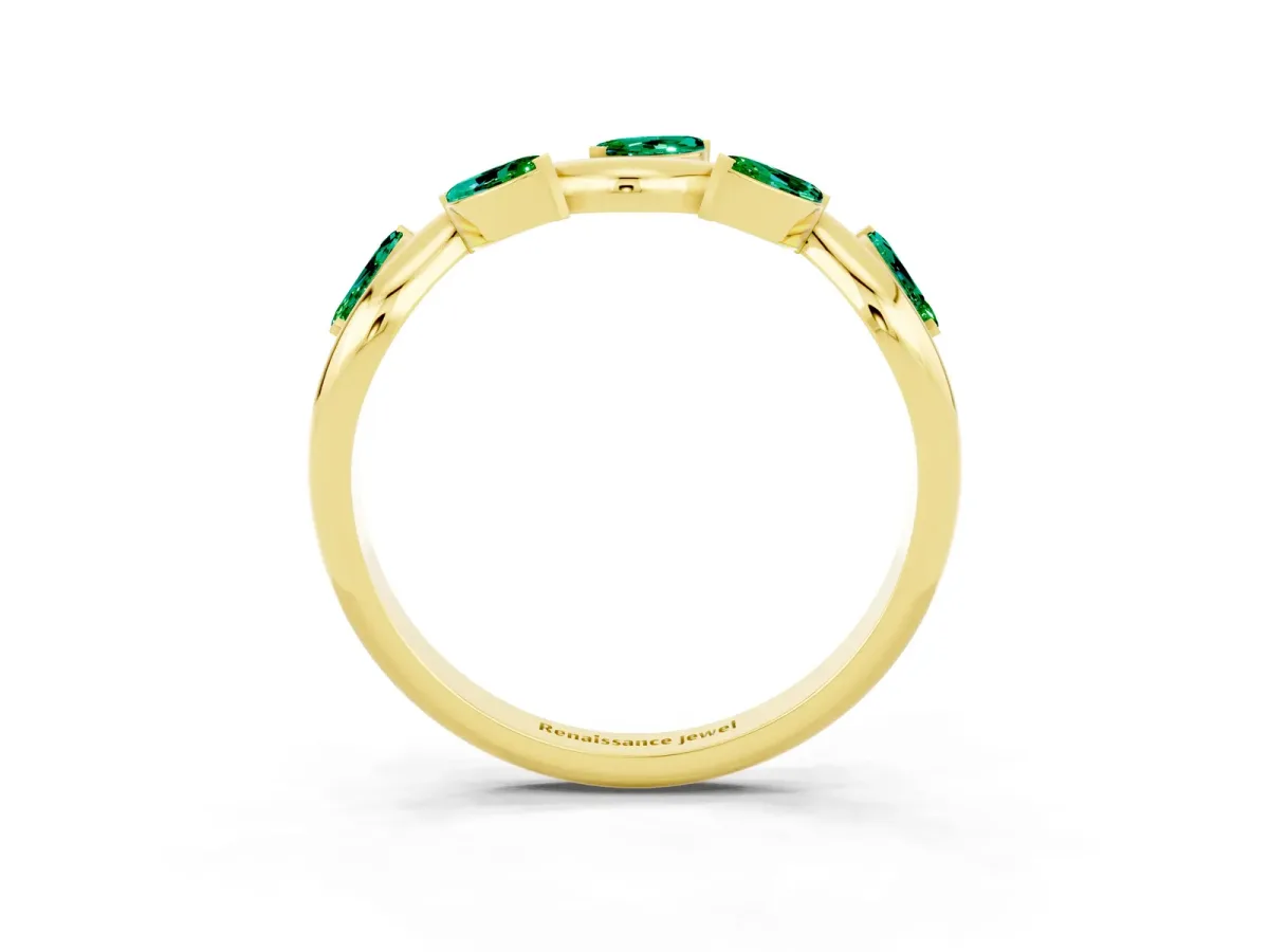 Marquise Emerald Twisted Band with Prong Setting Yellow gold