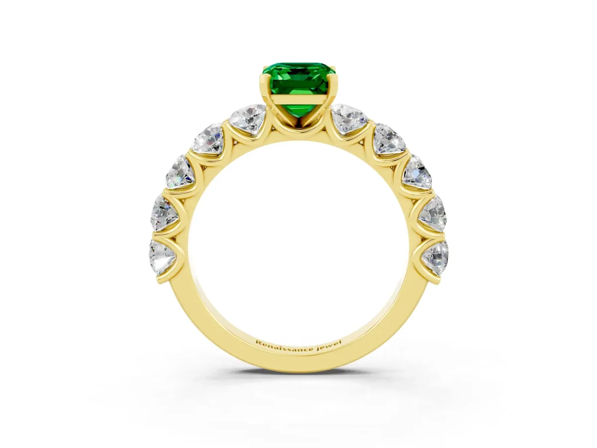 Emerald Cut Emerald Prong Setting with Side Stones on a Pave Band Yellow gold