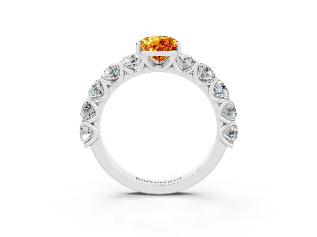 Pear Cut Citrine Prong Setting with Side Stones on a Pave Band Silver