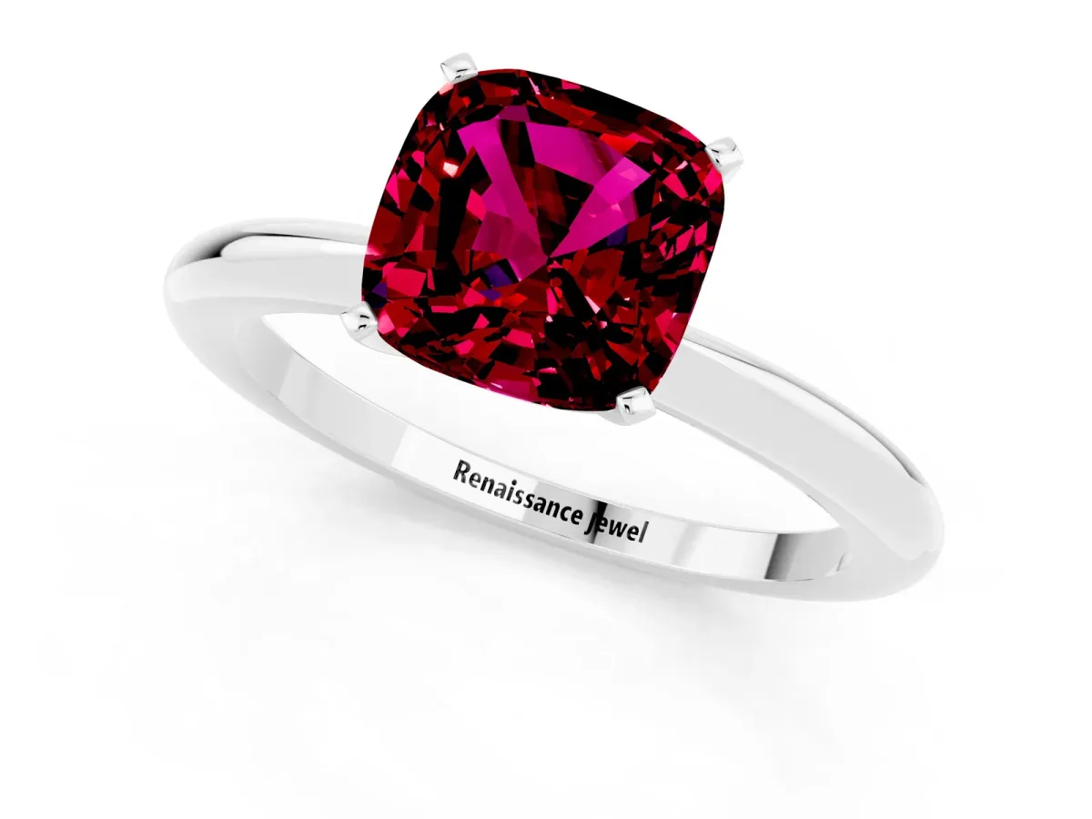 Cushion Cut Garnet Solitaire Ring with Six-Prong Setting and Classic Band Platinum