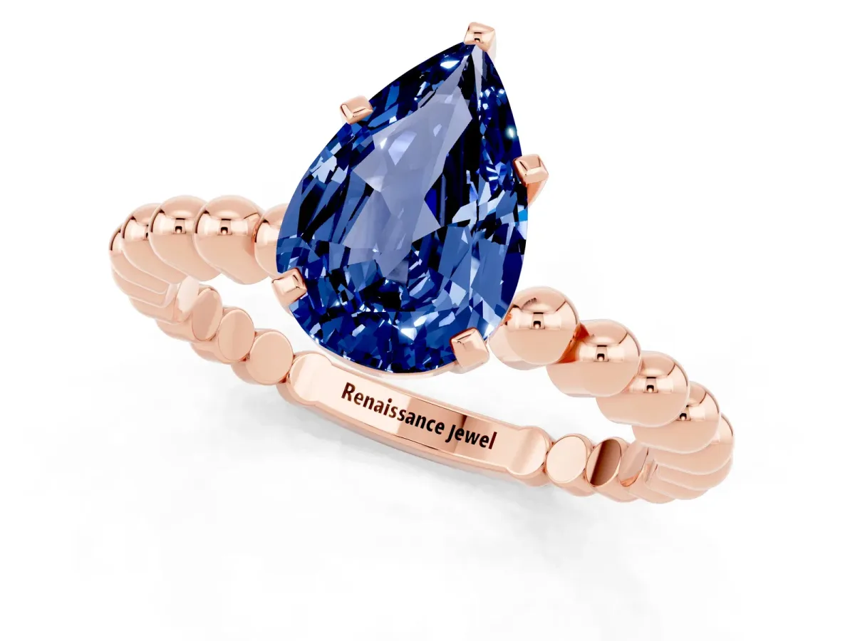Pear Cut Blue Sapphire Solitaire Ring with Beaded Band and Prong Setting Rose gold