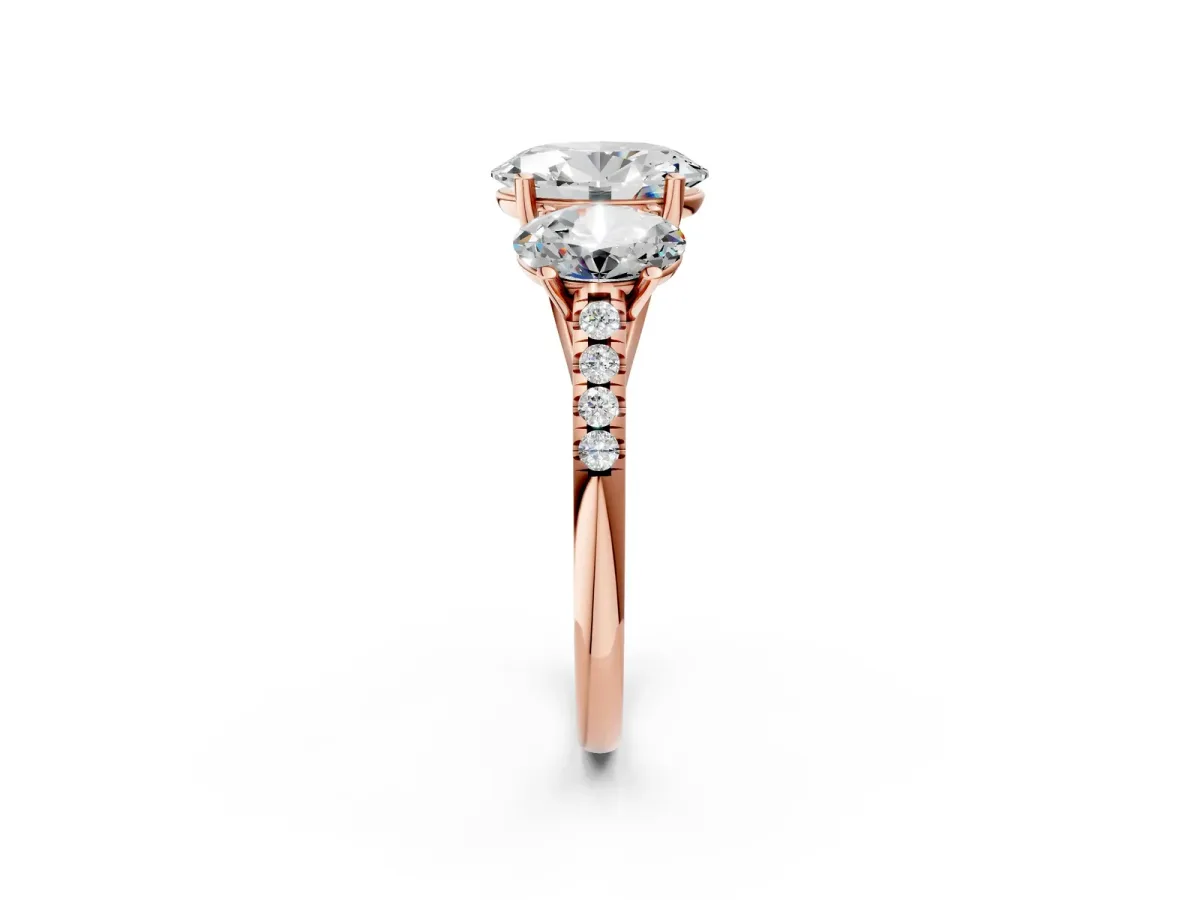Three-Stone Oval Cut Diamond Ring with Round Pavé Band and Prong Setting Rose gold