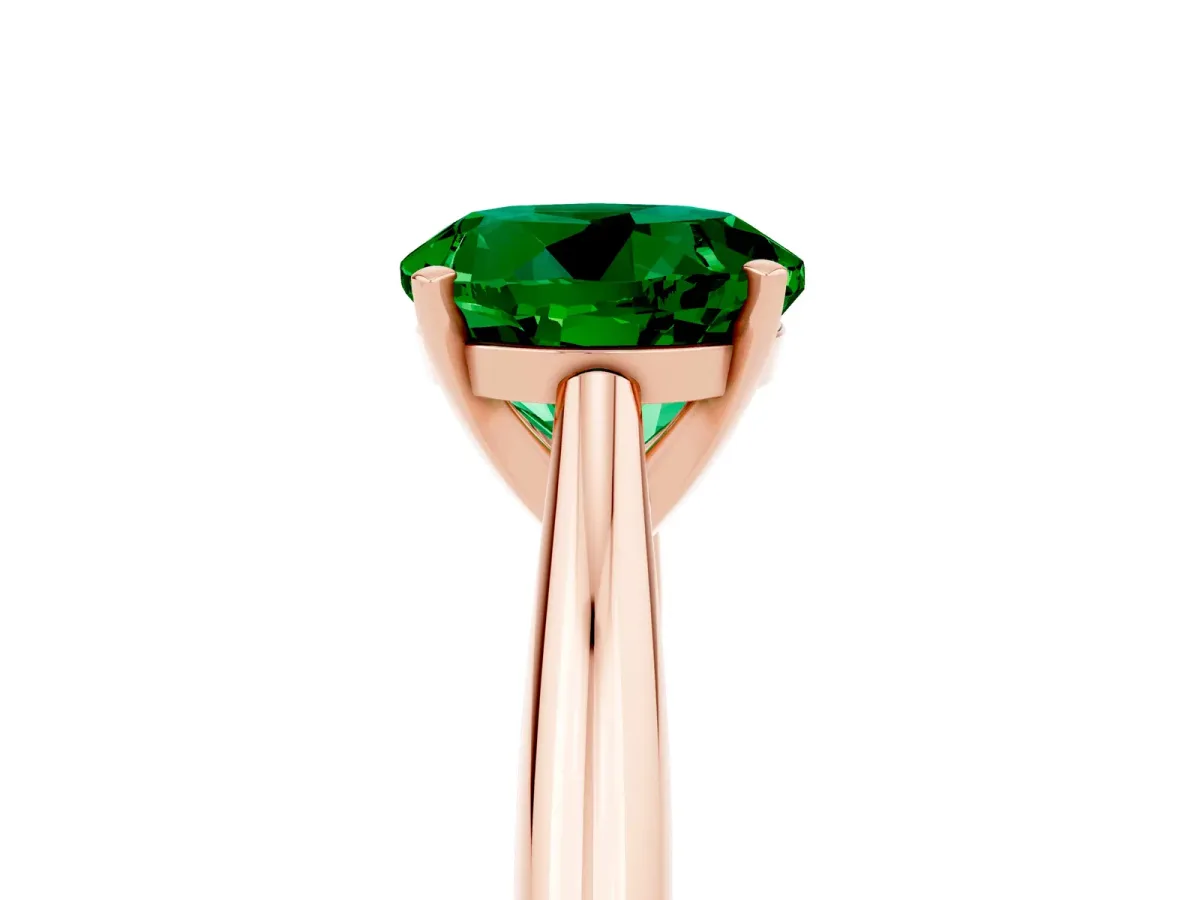 Round Cut Emerald Solitaire Engagement Ring with Cathedral Setting and Four-Prong Mount Rose gold
