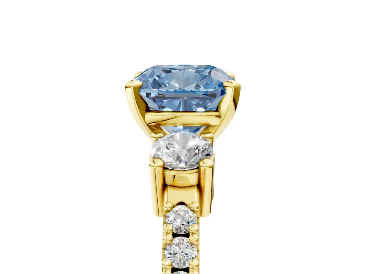 Fancy Blue Cushion Cut Cut Three-Stone Diamond Pavé Band with Prong Setting Yellow gold