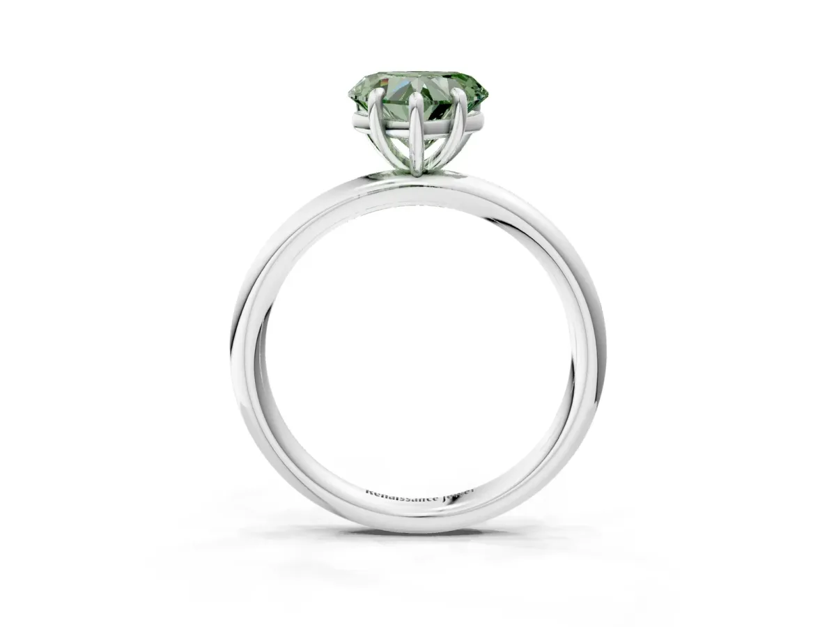 Fancy Green Heart Cut Solitaire Diamond Ring with Four-Prong Setting on a Plain Band Platinum