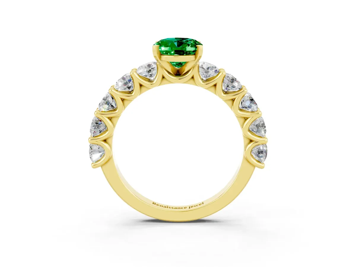 Oval Cut Emerald Prong Setting with Side Stones on a Pave Band Yellow gold