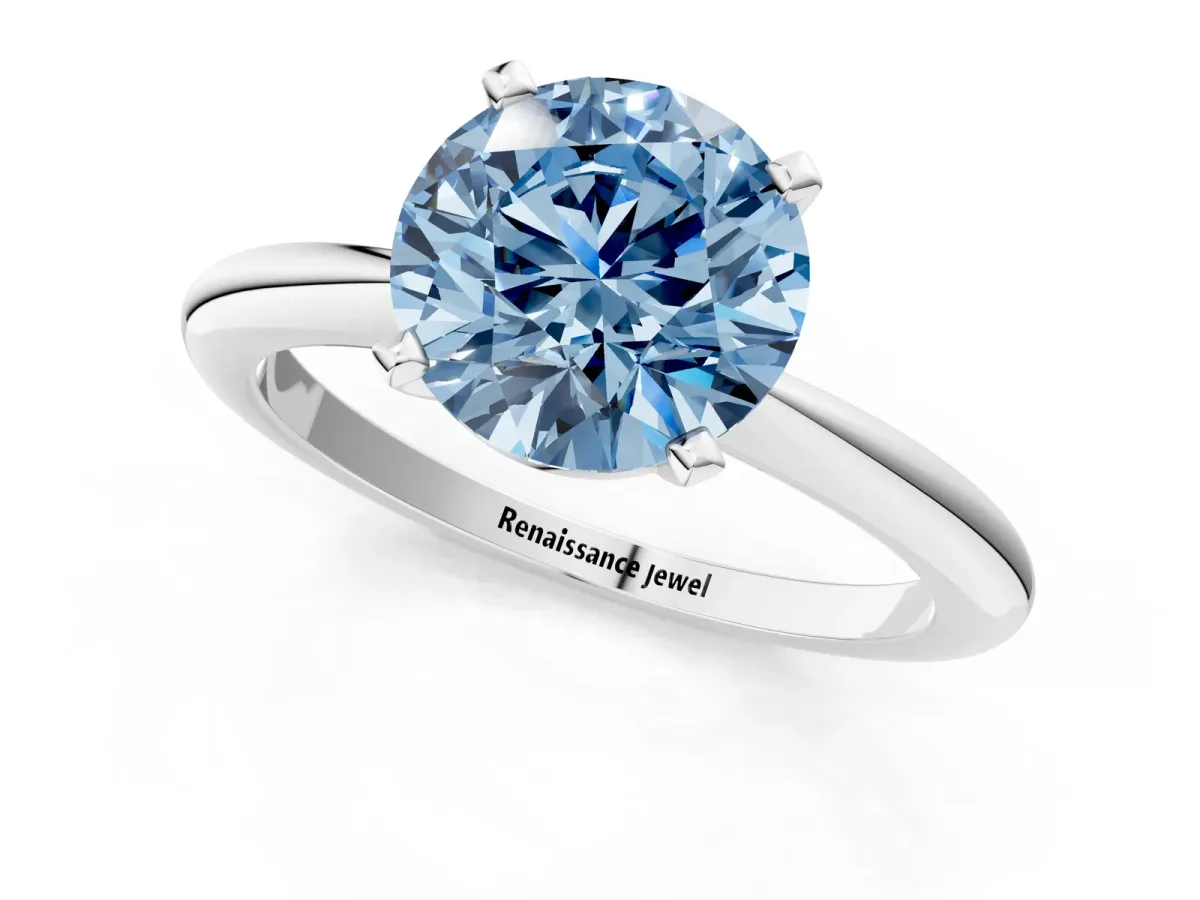 Fancy Blue Round Cut Diamond Solitaire Ring with Six-Prong Setting and Classic Band Platinum