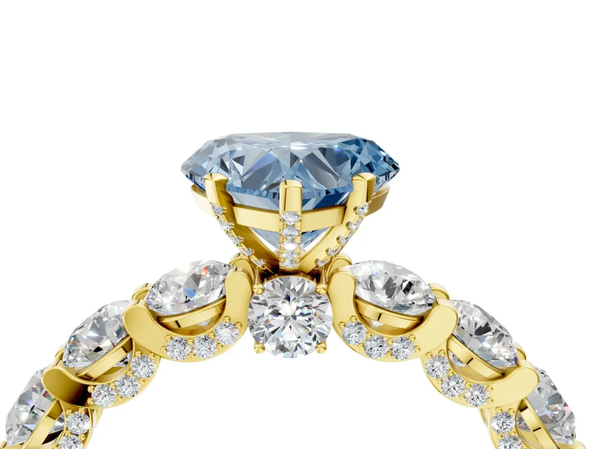 Fancy Blue Heart Cut Diamond Side Stone Engagement Ring with Four-Prong Setting Yellow gold