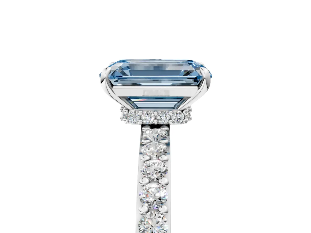 Fancy Blue Emerald Cut Diamond Solitaire Engagement Ring with Pavé Band and Four-Prong Setting Silver