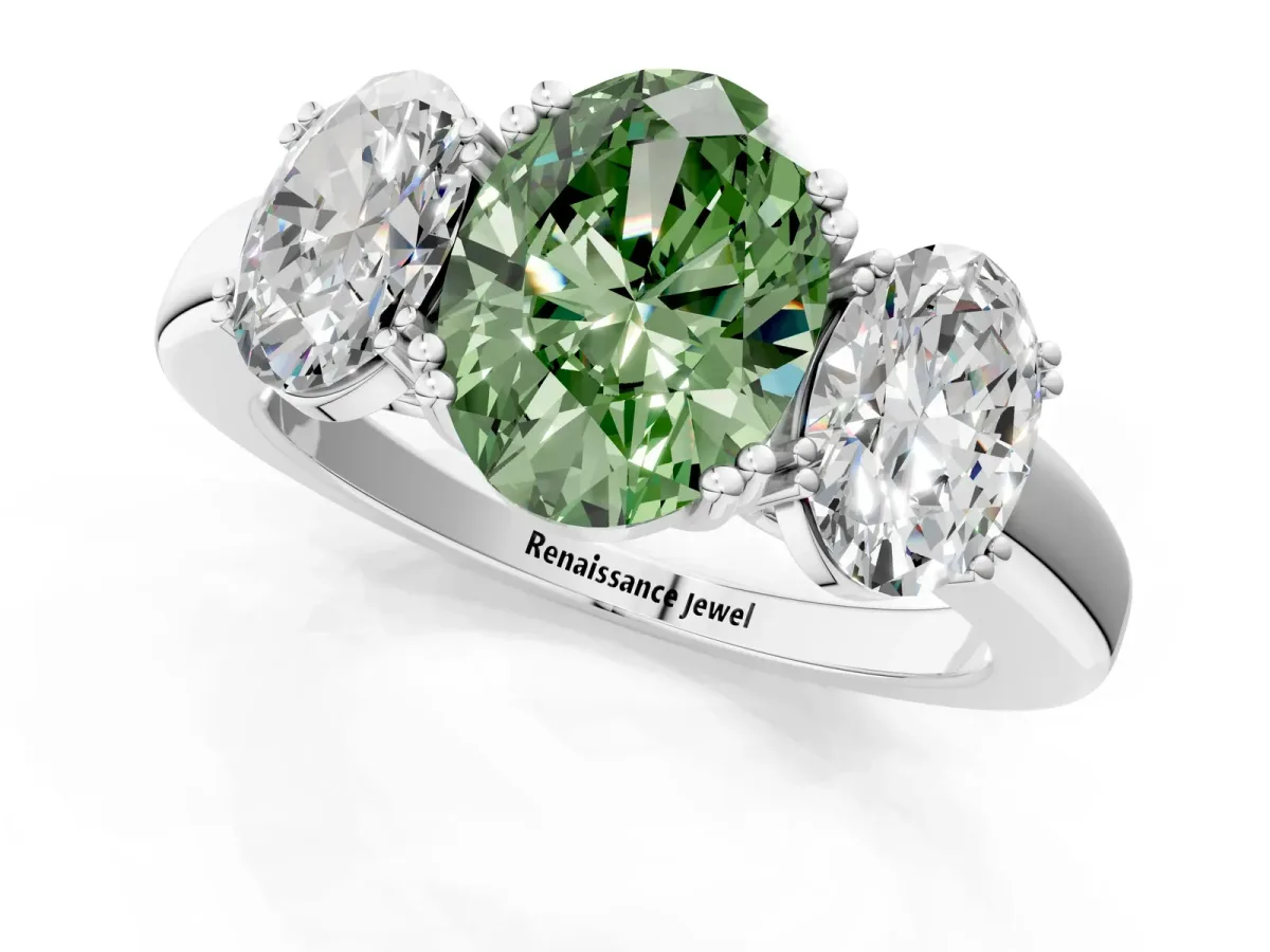 Fancy Green Three-Stone Oval Cut Cut Diamond Ring with Channel Set Band and Four-Prong Setting Platinum