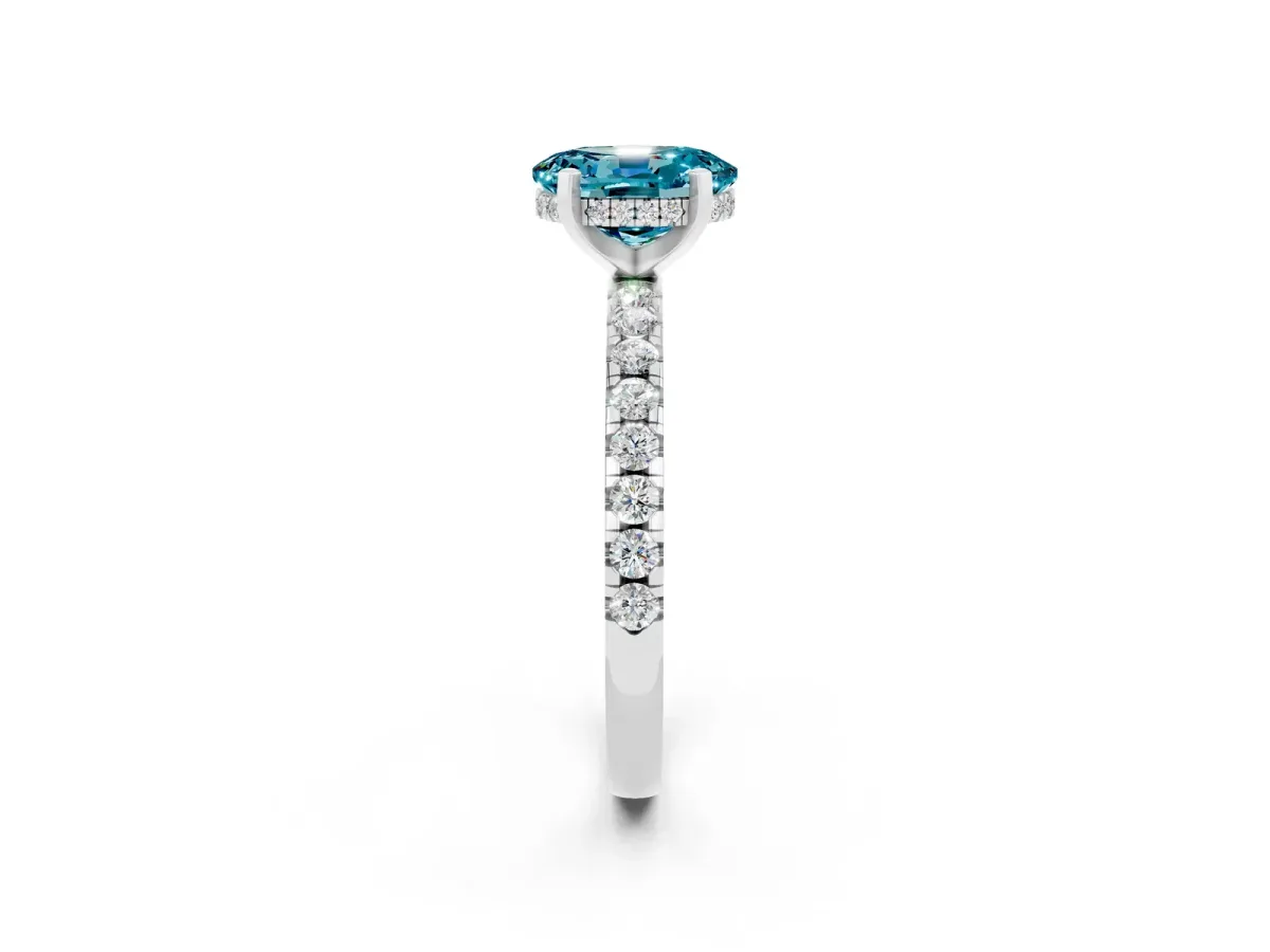 Oval Cut Blue Topaz Solitaire Ring with Round Pavé Band and Four-Prong Setting Silver
