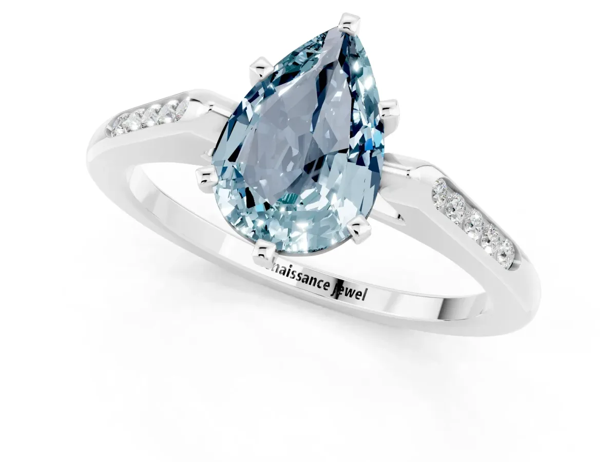Pear Cut Aquamarine Solitaire Ring with Channel Set Round Band and Prong Setting Silver