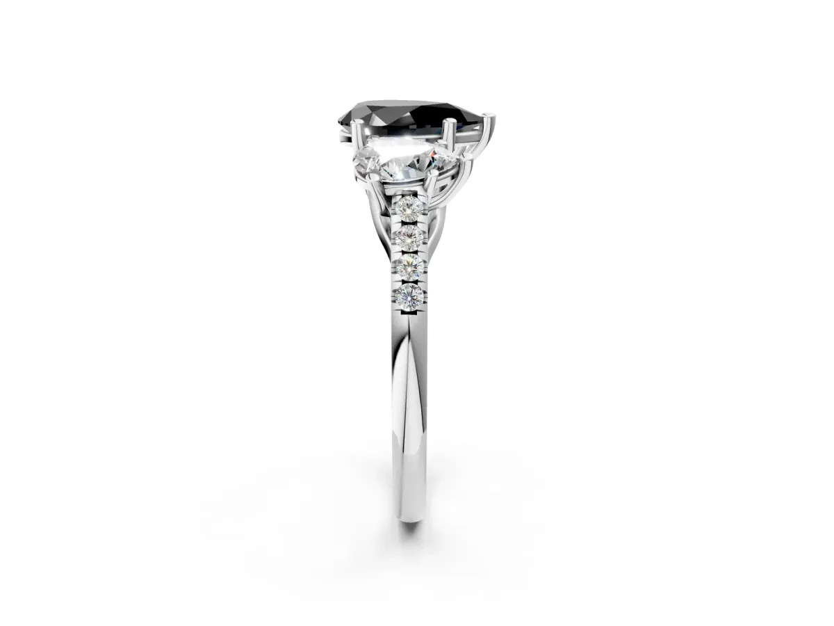 Fancy Black Three-Stone Pear Cut Diamond Ring with Round Pavé Band and Prong Setting Silver