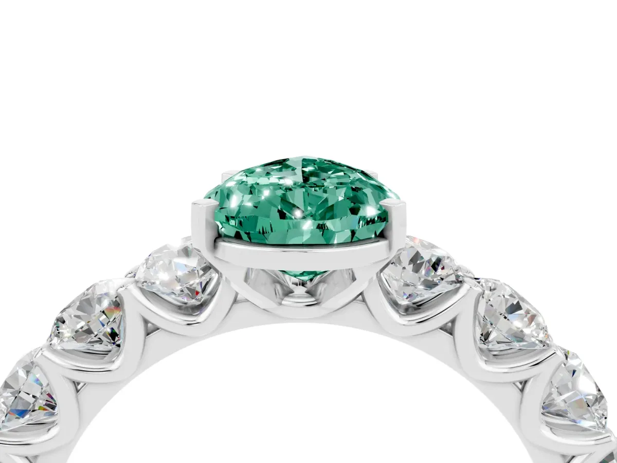 Pear Cut Green Sapphire Prong Setting with Side Stones on a Pave Band Silver