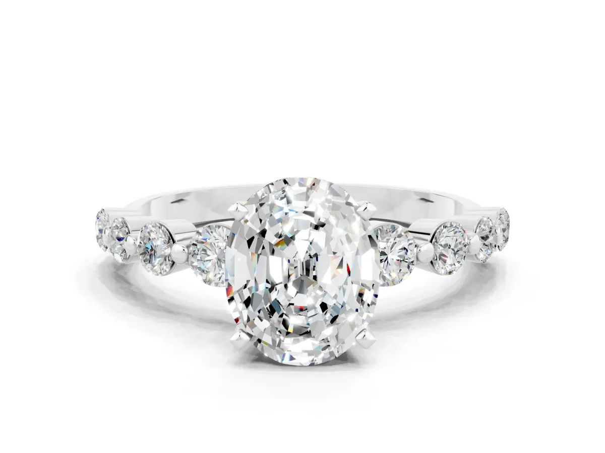 Oval Cut Solitaire Moissanite Ring with Pave Band and Four-Prong Setting Silver