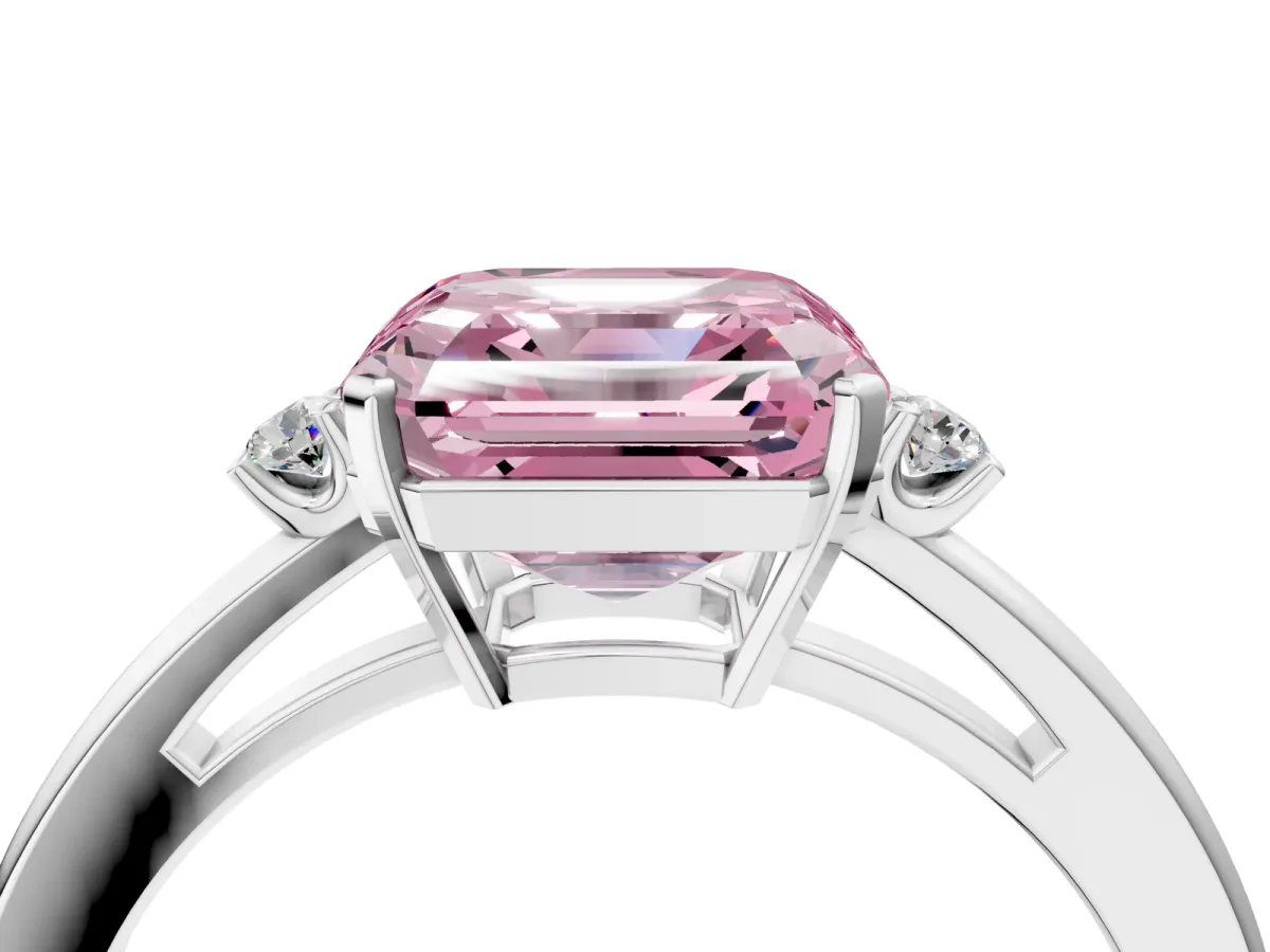 Fancy Pink Asscher Cut Cut Three-Stone Solitaire Ring with Round Accent Diamonds and Four-Prong Setting Platinum