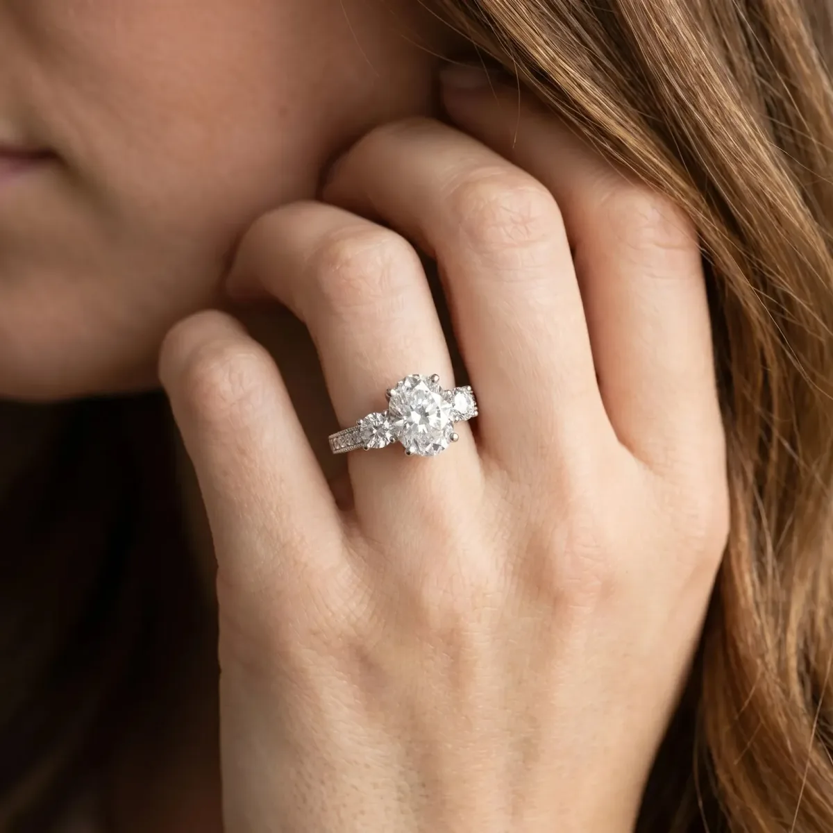 Asscher Cut Three-Stone Diamond Ring with Pavé Band and Four-Prong Setting Platinum