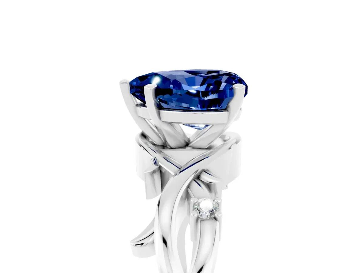 Heart Cut Blue Sapphire Solitaire Ring with Twisted Band and Prong Setting Silver