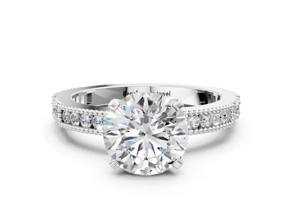 Round Cut Solitaire with Pavé Band and Four-Prong Setting Platinum