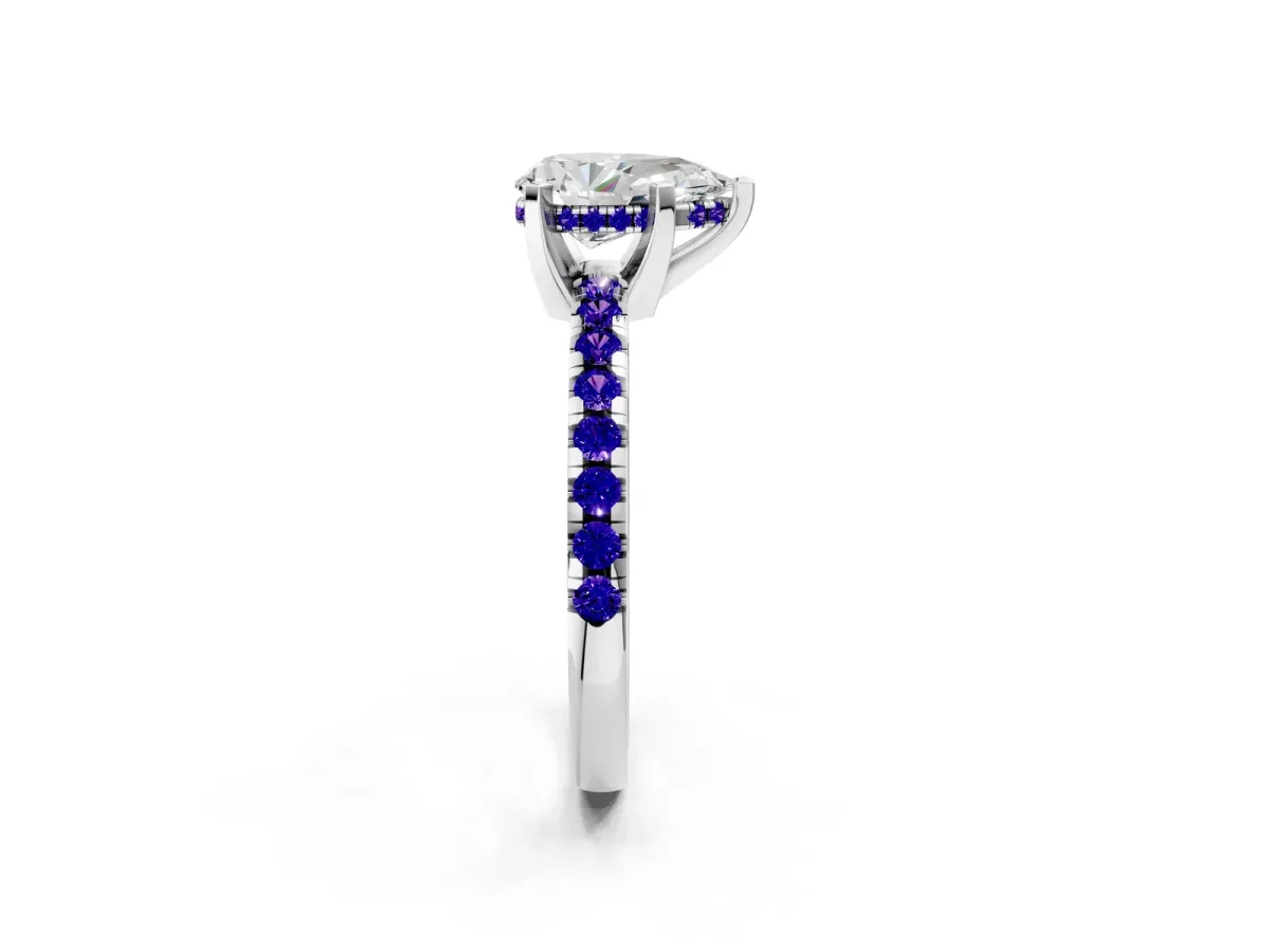 Pear Cut Diamond Solitaire Ring with Round Tanzanite Pavé Band and Four-Prong Setting Silver