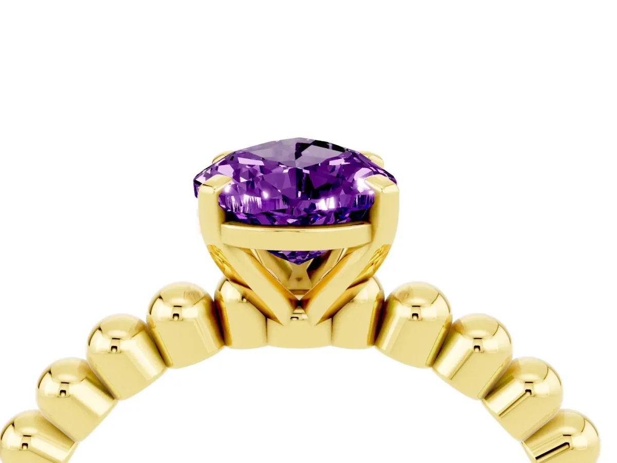 Pear Cut Amethyst Solitaire Ring with Beaded Band and Prong Setting Yellow gold
